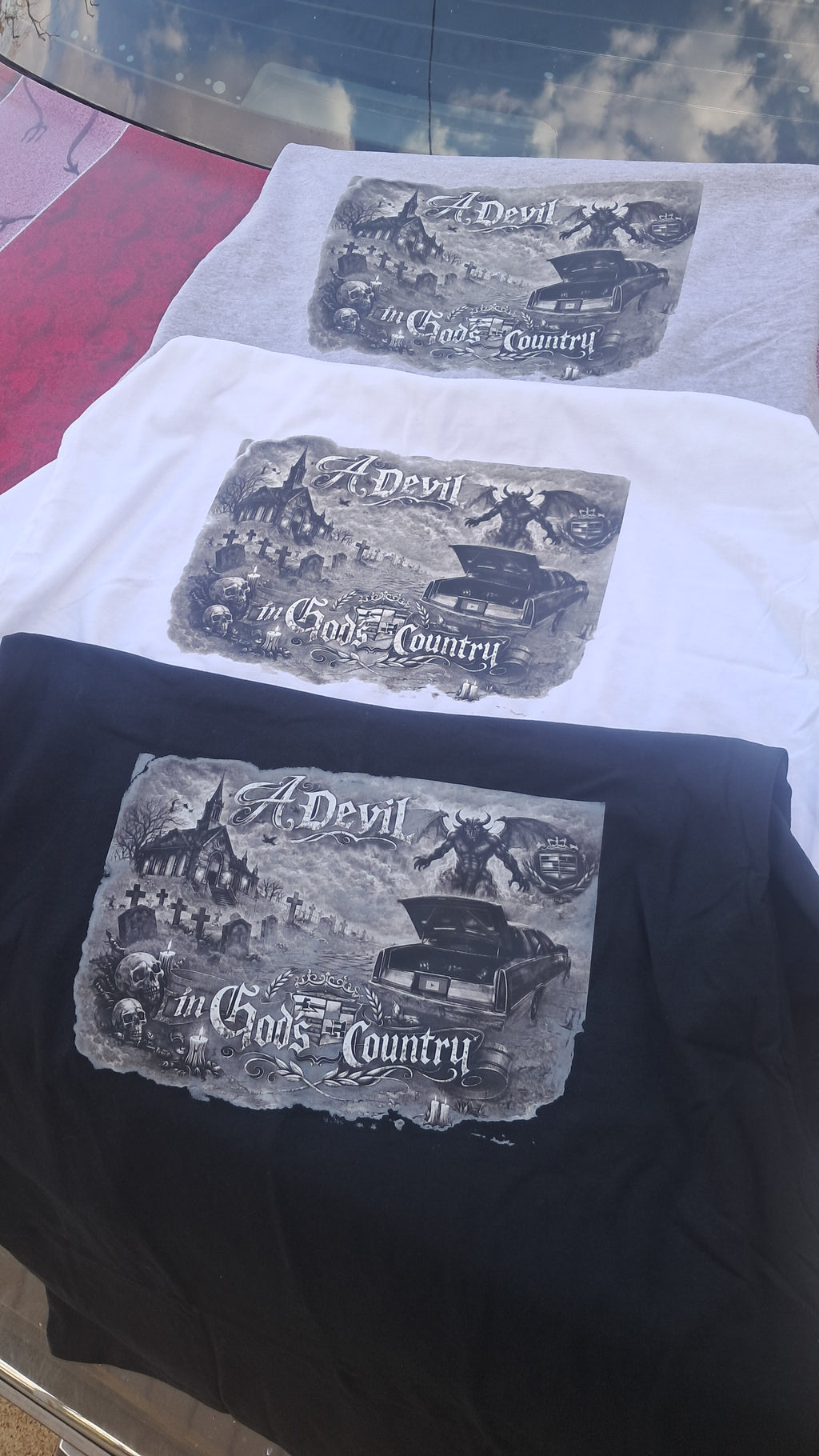 "A Devil In God's Country" Tee Shirts (FRONT PRINT)